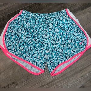 Nike blue and pink dry fit running shorts size xl kids / small women’s